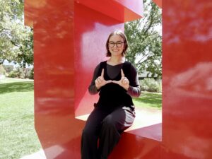 Mia Sheneman Flashing the U